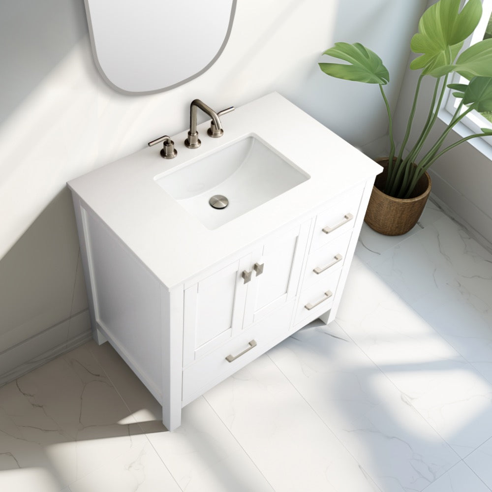 The Vanea 36 inch Bathroom Vanity in White with White Quartz Top includes a rectangular sink, silver faucet, and drawer handles. Sunlight brightens the white tile floor, while a green potted plant brings a touch of freshness to the space.