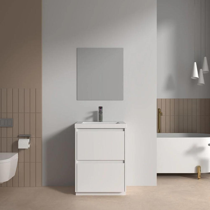 A modern bathroom with neutral tones featuring the Arvia 24 inch Bathroom Vanity with Sink, a square mirror above it, a wall-mounted toilet, plus a bathtub with gold fixtures and pendant lights.
