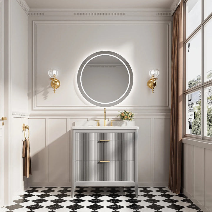 A bathroom featuring a mirror, a sink, and the stylish Aveline 36 Inch Freestanding Bathroom Vanity With Top.