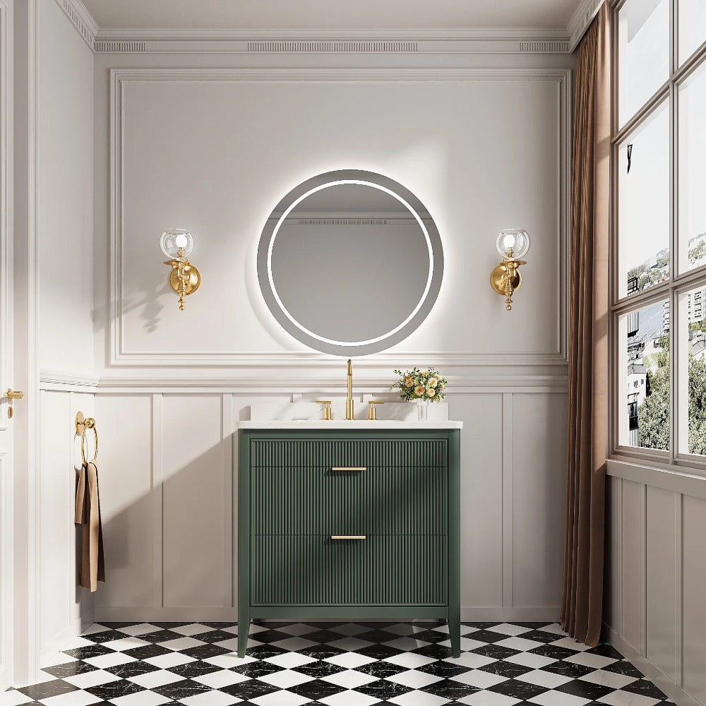 Elegant bathroom with black-and-white checkered floor, Aveline 36 Inch Freestanding Bathroom Vanity with Top and gold handles, round backlit mirror, gold wall sconces, brown curtains, window for natural light, and flowers on the vanity.