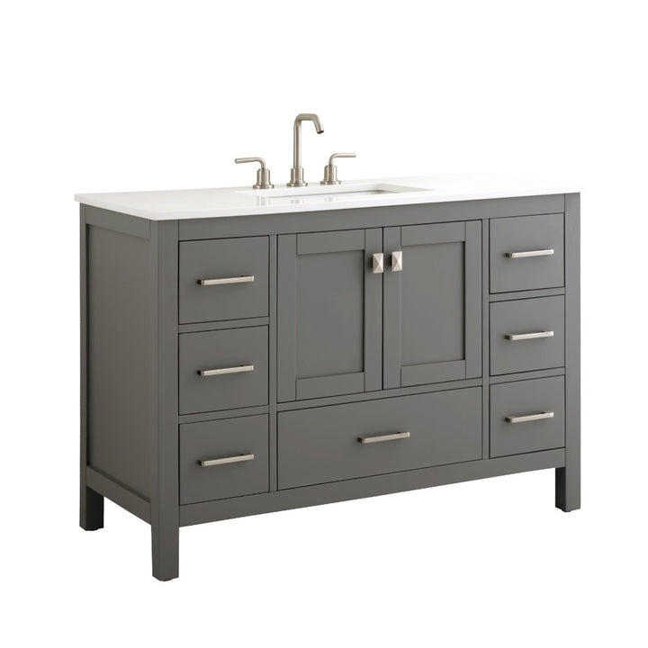 The Vanea 48 inch Bathroom Vanity in Gray with White Quartz Top features a modern gray finish, white quartz countertop with built-in sink, silver faucet, and nine drawers with sleek silver handles.