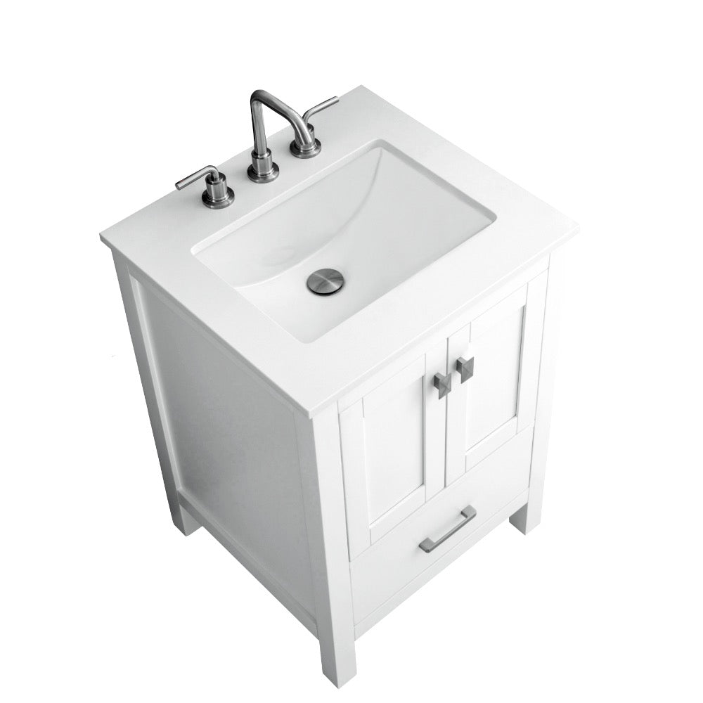 The Vanea 24 inch Bathroom Vanity in White with White Quartz Top showcases a modern design with a rectangular sink, chrome faucet, two handles, double-door cabinet, and lower drawer, photographed from above at an angle.