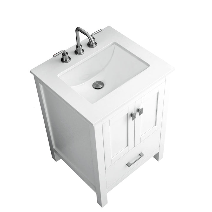 The Vanea 24 inch Bathroom Vanity in White with White Quartz Top showcases a modern design with a rectangular sink, chrome faucet, two handles, double-door cabinet, and lower drawer, photographed from above at an angle.