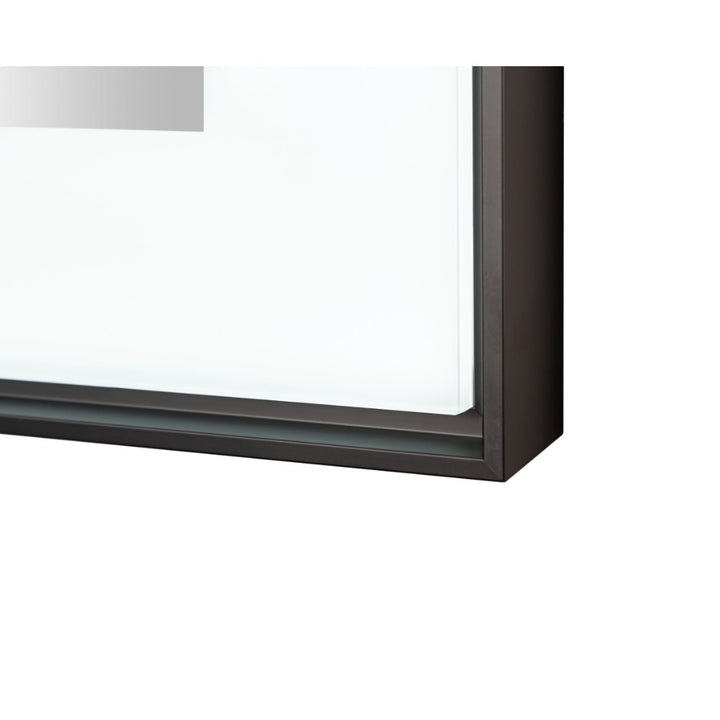 Close-up of the bottom right corner of the Lexington 72 inch x 36 inch LED Lighted Slim Frame Mirror, featuring a black frame, clear glass, and a white background.