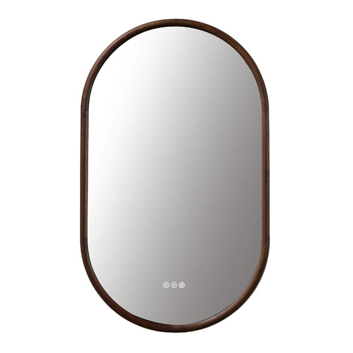 The Zen LED Mirror features an oval shape, a dark wooden frame, and three small circular touch buttons at the bottom center, set against a plain white background.