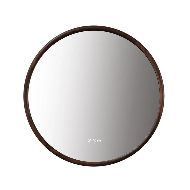 The Zen LED Mirrors have a round shape, dark wooden frame, and three small circular touch buttons at the bottom center, uniting modern technology with timeless design.