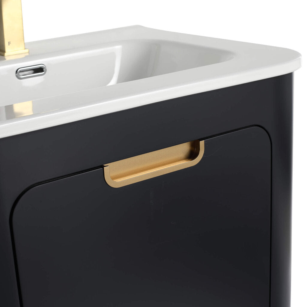Close-up of the Shireplace 24 Inch Bathroom Vanity with Sink, showcasing its black cabinet, white countertop, integrated sink, and elegant gold handle and modern faucet. Its minimalist design is both sleek and sophisticated.