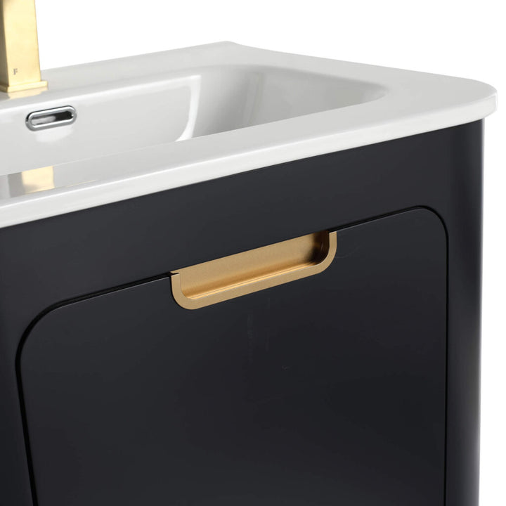 Close-up of the Shireplace 24 Inch Bathroom Vanity with Sink, showcasing its black cabinet, white countertop, integrated sink, and elegant gold handle and modern faucet. Its minimalist design is both sleek and sophisticated.