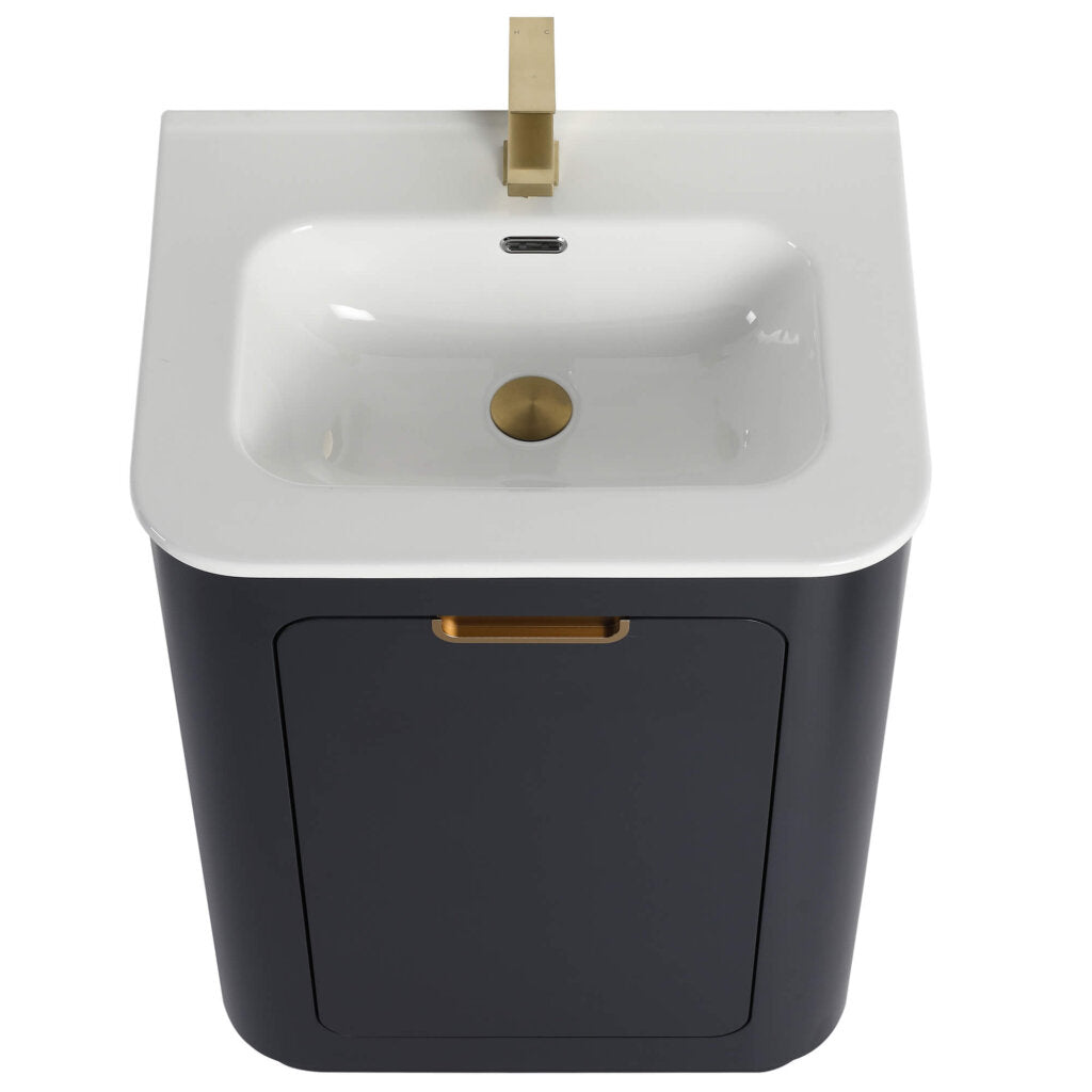 The Shireplace 24 Inch Bathroom Vanity With Sink boasts a modern white rectangular basin with a gold faucet, set upon a sleek, dark cabinet featuring a gold handle. Its minimalist design enhances any bathroom space.