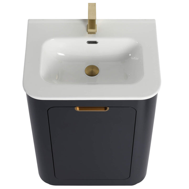 The Shireplace 24 Inch Bathroom Vanity With Sink boasts a modern white rectangular basin with a gold faucet, set upon a sleek, dark cabinet featuring a gold handle. Its minimalist design enhances any bathroom space.