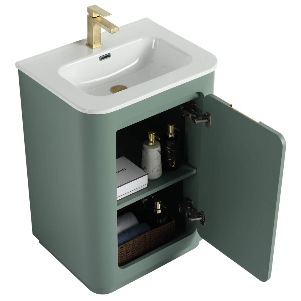 The Shireplace 24 Inch Bathroom Vanity With Sink showcases a modern green finish with an open-door cabinet. It includes a white top, gold faucet, and offers storage for items like bottles, a book, and a basket for stylish organization.
