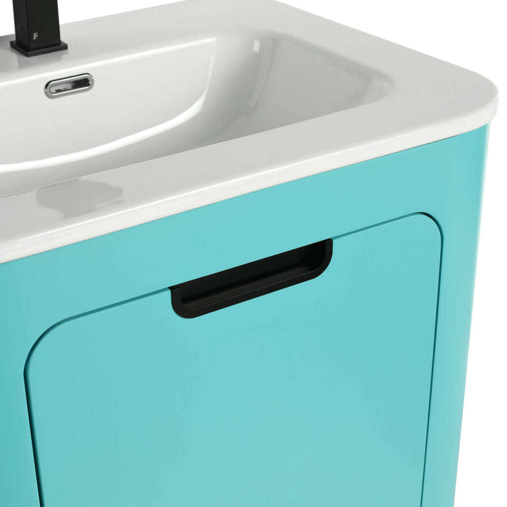 Close-up of the Shireplace 24 Inch Bathroom Vanity With Sink, featuring a turquoise cabinet, black recessed handle, and a rectangular white basin. The squared black faucet offers a striking contrast to the smooth curves of both the cabinet and basin.