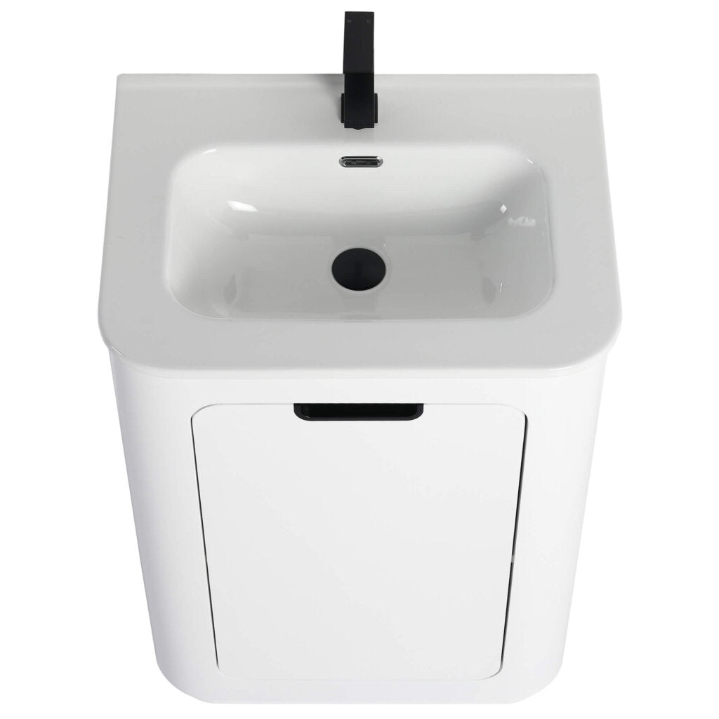 The Shireplace 24 Inch Bathroom Vanity With Sink features a sleek top view, showcasing a white rectangular sink with rounded edges paired with a black faucet and drain. It includes an elegantly set cabinet beneath the vanity, equipped with a small rectangular front handle.