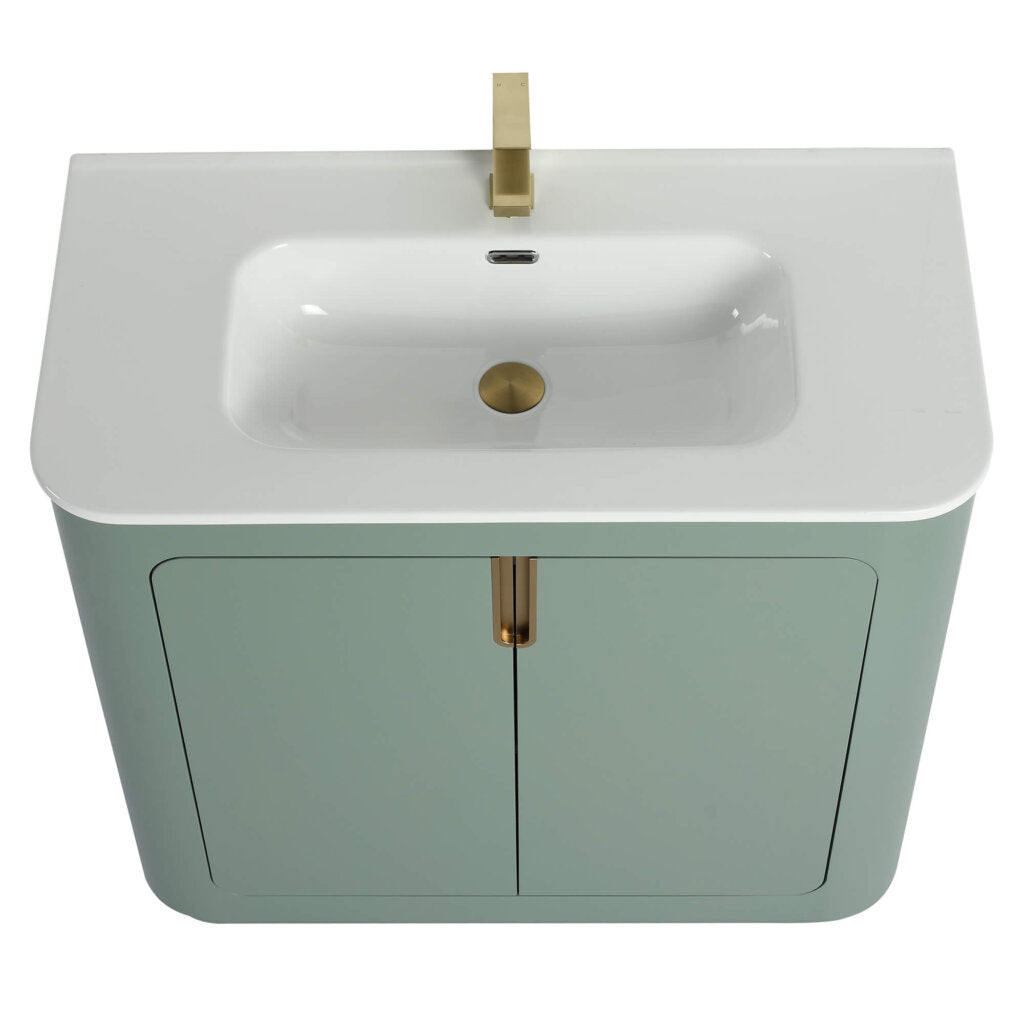 Top view of the Shireplace 36 Inch Bathroom Vanity With Sink, highlighting its modern design. It includes a white sink with a brass faucet, light green base, two cabinet doors with brass handles, and a central drain.