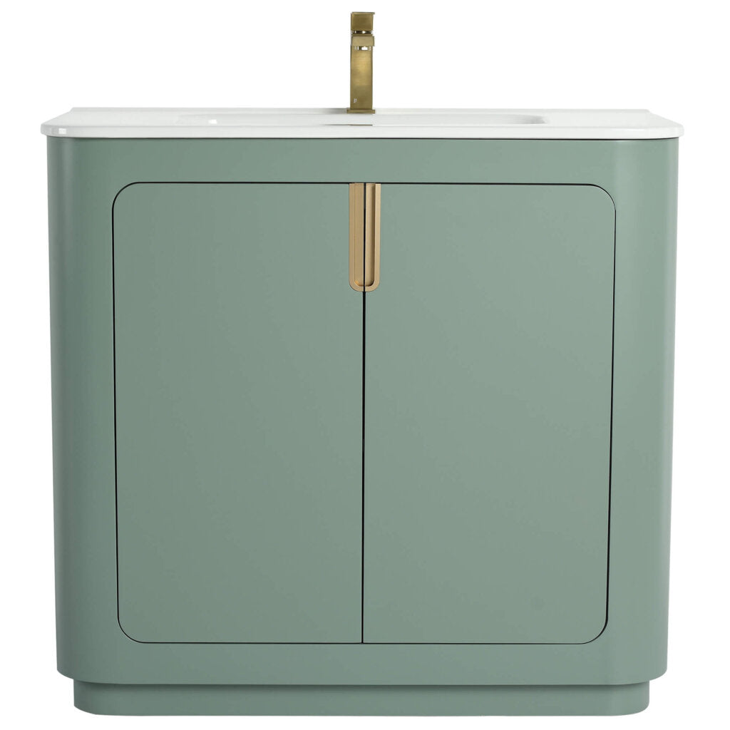 The Shireplace 36 Inch Bathroom Vanity With Sink offers a modern touch with a smooth light green finish, brass accents, and a white countertop. It includes a single brass faucet and two cabinet doors for storage, maintaining a sleek, minimalistic design.
