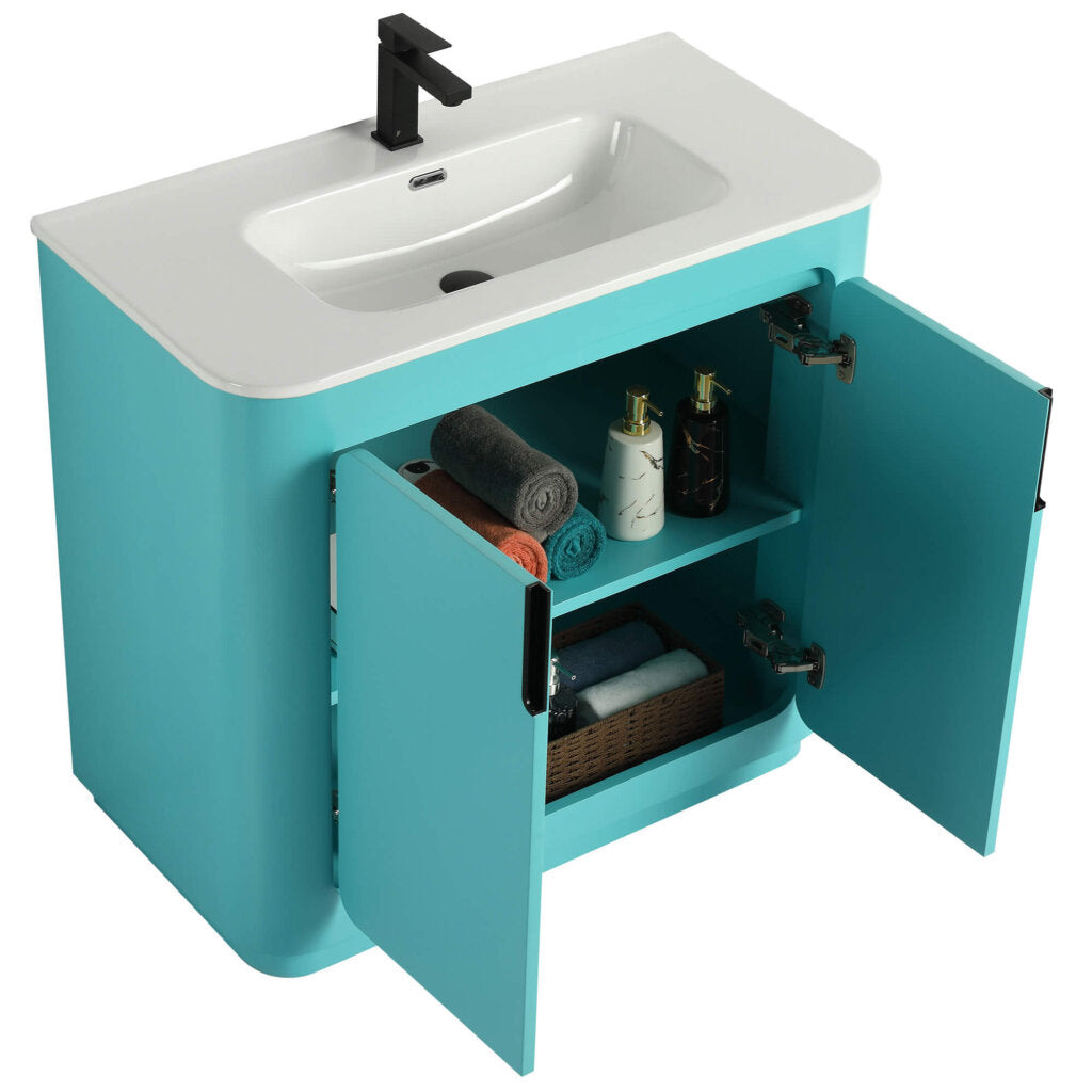 The Shireplace 36 Inch Bathroom Vanity With Sink adds a modern touch with its turquoise finish and open cabinet design, showcasing a glossy white sink and sleek black faucet. Inside, shelves are neatly arranged with rolled towels, bottles, and a woven basket.