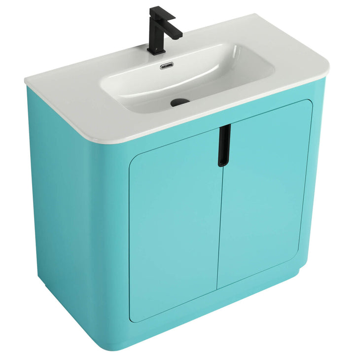Introducing the Shireplace 36 Inch Bathroom Vanity, where modern design meets functionality. This vanity features a light blue cabinet with a white countertop, built-in rectangular sink, and sleek black faucet. Below the sink, two cabinet doors offer ample storage for your essentials.