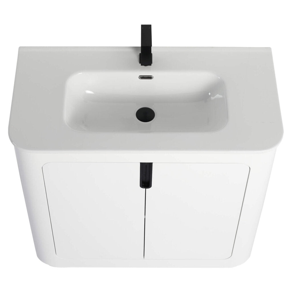 The Shireplace 36 Inch Bathroom Vanity With Sink features a white rectangular basin and an integrated cabinet with double doors adorned with sleek vertical black handles. A central black faucet and drain complete its modern, minimalist style.