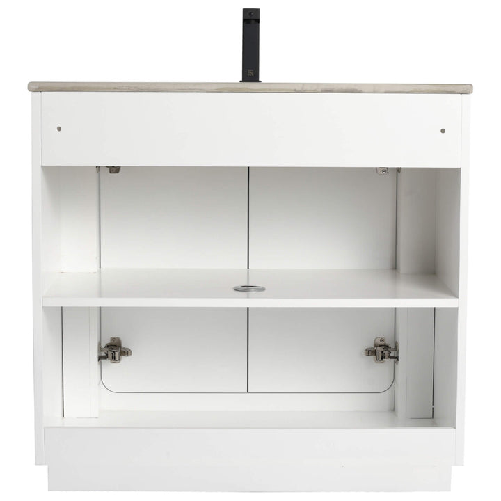 The Shireplace 36 Inch Bathroom Vanity With Sink boasts a pristine, open-faced design with silver hinges and two spacious shelves. The countertop mimics light stone elegance and includes a pre-drilled hole for easy plumbing installation.