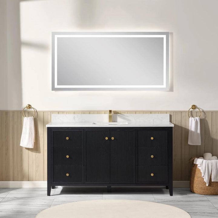 Modern bathroom featuring the Torino 60 Inch Single Bathroom Vanity with gold handles, marble countertop, and a large illuminated mirror above. Gold towel rings and light wood paneled walls complete the elegant look.