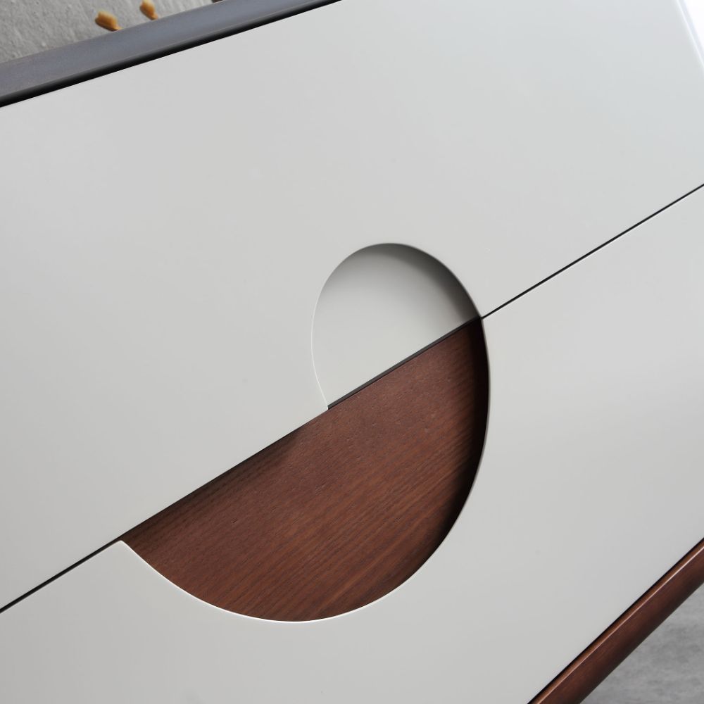Close-up of the Burano 48 inch Beige Freestanding Bathroom Vanity, a modern cabinet with two white doors featuring half-circle cutouts that form a circular opening when closed.
