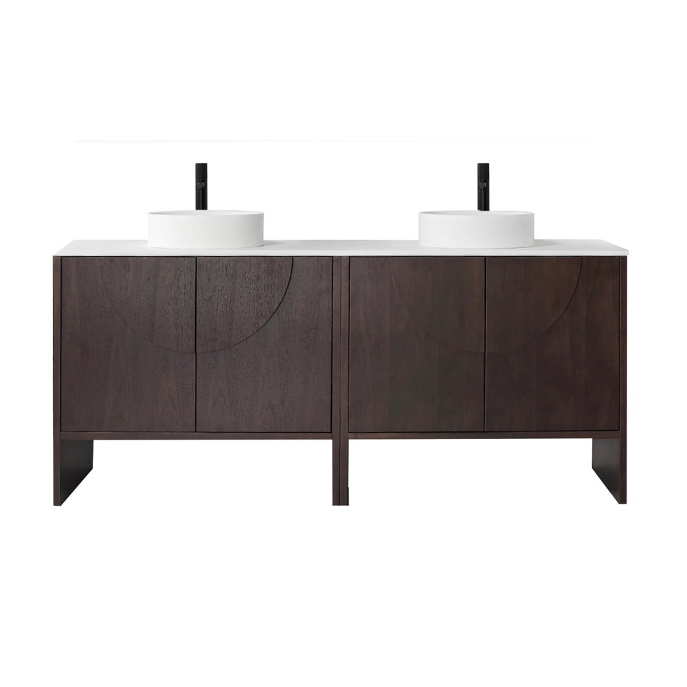 The Celle 72 Inch Double Bathroom Vanity With Vessel Sinks features dark wood cabinets, two white vessel sinks, and black faucets on a white countertop. Subtle curved patterns decorate the cabinet doors against a plain white background.