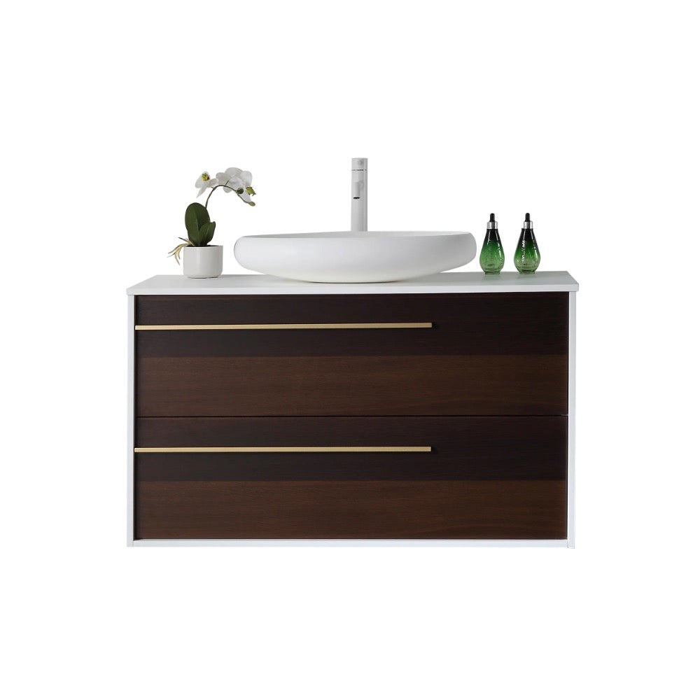 The Goreme 42 Inch Wall Mount Bathroom Vanity With Vessel Sink features dark wood drawers, gold handles, a white countertop with a round vessel sink, a white faucet, two green soap dispensers, and a small potted orchid plant.