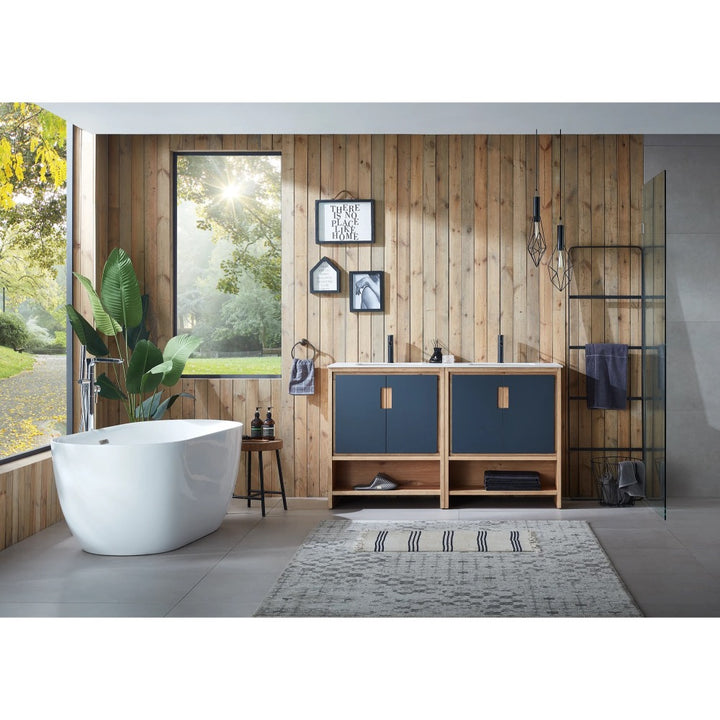 Modern bathroom with a freestanding white tub, wood-paneled wall, and a Lyon 60 Inch Double Bathroom Vanity with Top. Sunlight streams through the large window, highlighting blue cabinets, an indoor plant, pendant lights, and a patterned rug.