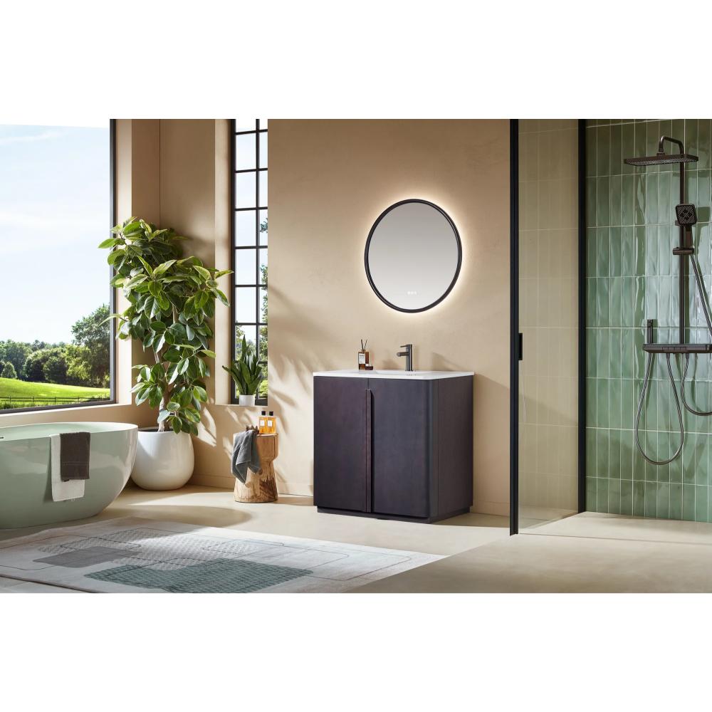 Modern bathroom featuring the Parma 36 Inch Bathroom Vanity With Top, a freestanding tub, green plant, round mirror, walk-in shower with green tiles, and a large window for abundant natural light and outdoor views.