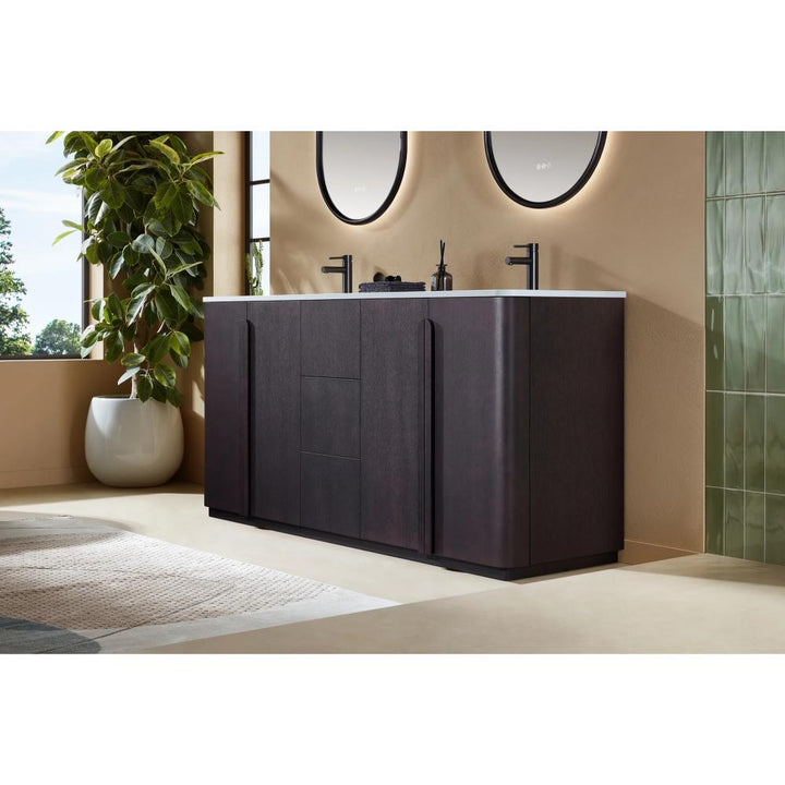 A modern bathroom features the Parma 72 Inch Double Bathroom Vanity With Top in dark wood, two round mirrors, black faucets, green tile accents, a large potted plant, and natural light streaming in from a window.