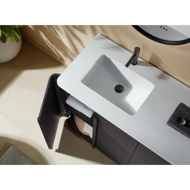 The Parma 72 Inch Double Bathroom Vanity With Top features modern rectangular white sinks, black faucets, open cabinet doors with towels and baskets inside, and a potted plant in the corner for added style.
