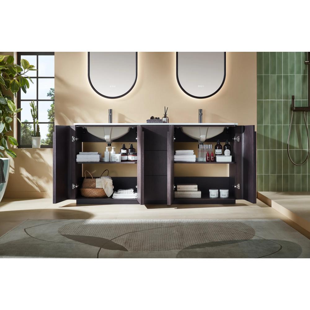 A modern bathroom featuring a Parma 72 Inch Double Bathroom Vanity With Top, dark wood cabinets with open doors showing towels and toiletries, two sinks with oval mirrors, plants, a walk-in shower on the right, light walls, and a patterned rug.