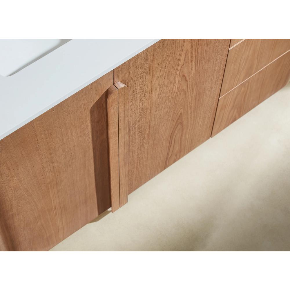 Close-up of the Parma 48 Inch Bathroom Vanity With Top featuring minimalist vertical handles and drawers, set against an off-white countertop and a light-colored floor.