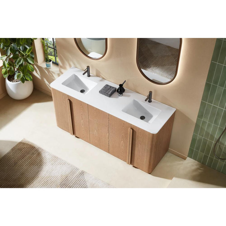 A modern bathroom features the Parma 72 Inch Double Bathroom Vanity With Top, wood cabinets, black faucets, a dark soap dispenser, a towel between double sinks, large mirrors, a potted plant, and striking green-tiled walls.