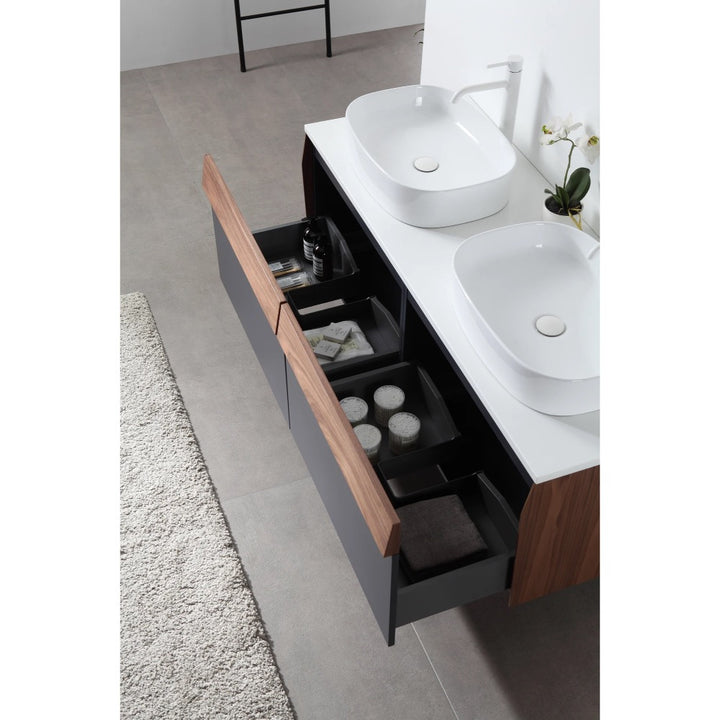 The Ronda 55 Inch Wall Mount Vanity with Double Vessel Sinks offers a modern look with white sinks, a sleek countertop, open storage for towels, and stylish wood accents that complement light rugs and gray tiled floors.