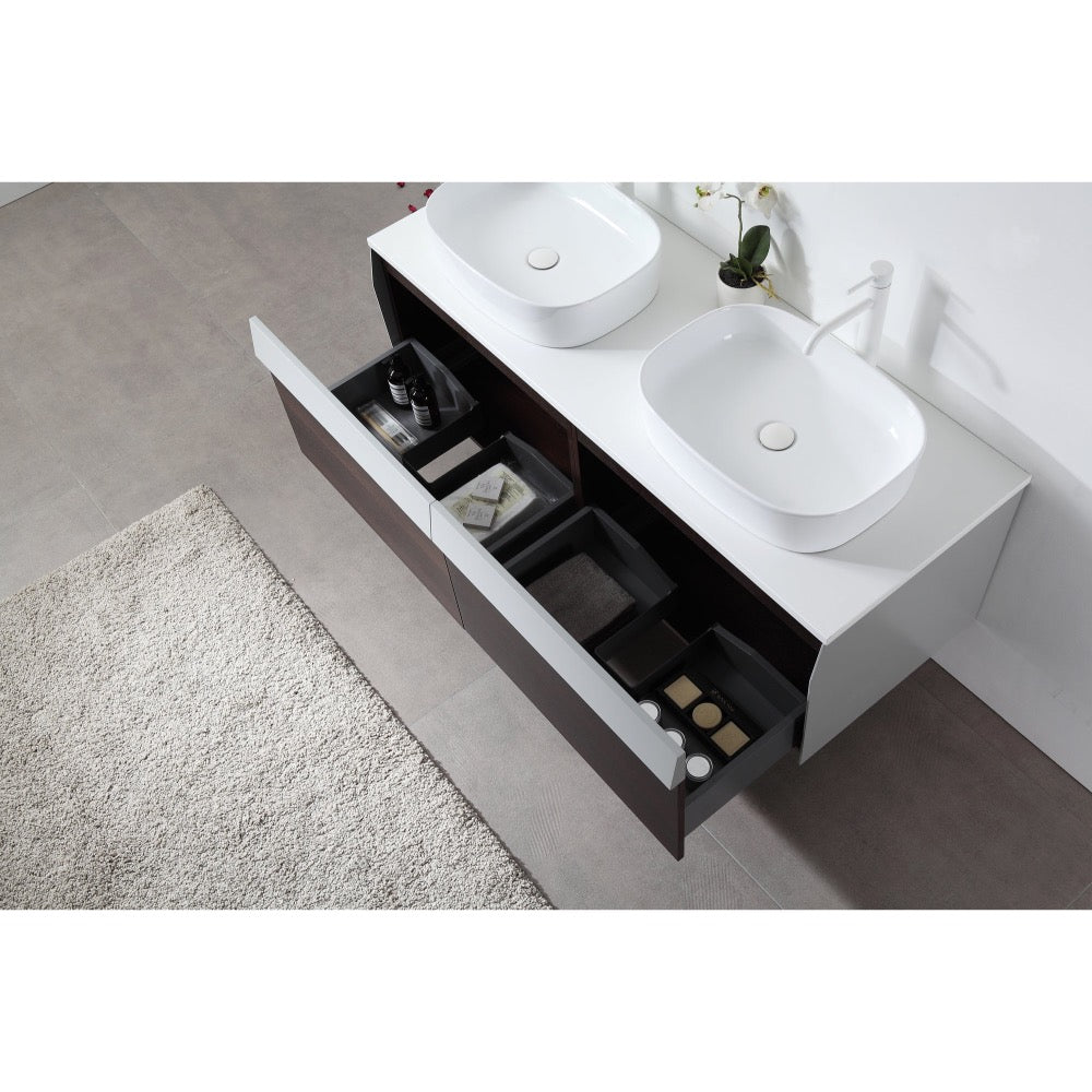 The Ronda 55 Inch Wall Mount Vanity with Double Vessel Sinks showcases open drawers with organized compartments, set on a gray tile floor near a beige rug. A small plant brings freshness to the modern bathroom decor.