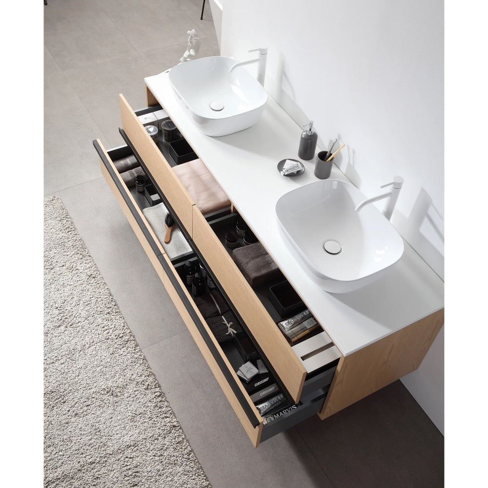 The Sintra 72 Inch Wall Mount Vanity with Double Vessel Sinks includes wooden drawers for organized storage, displayed above a light gray tile floor and a textured beige rug.